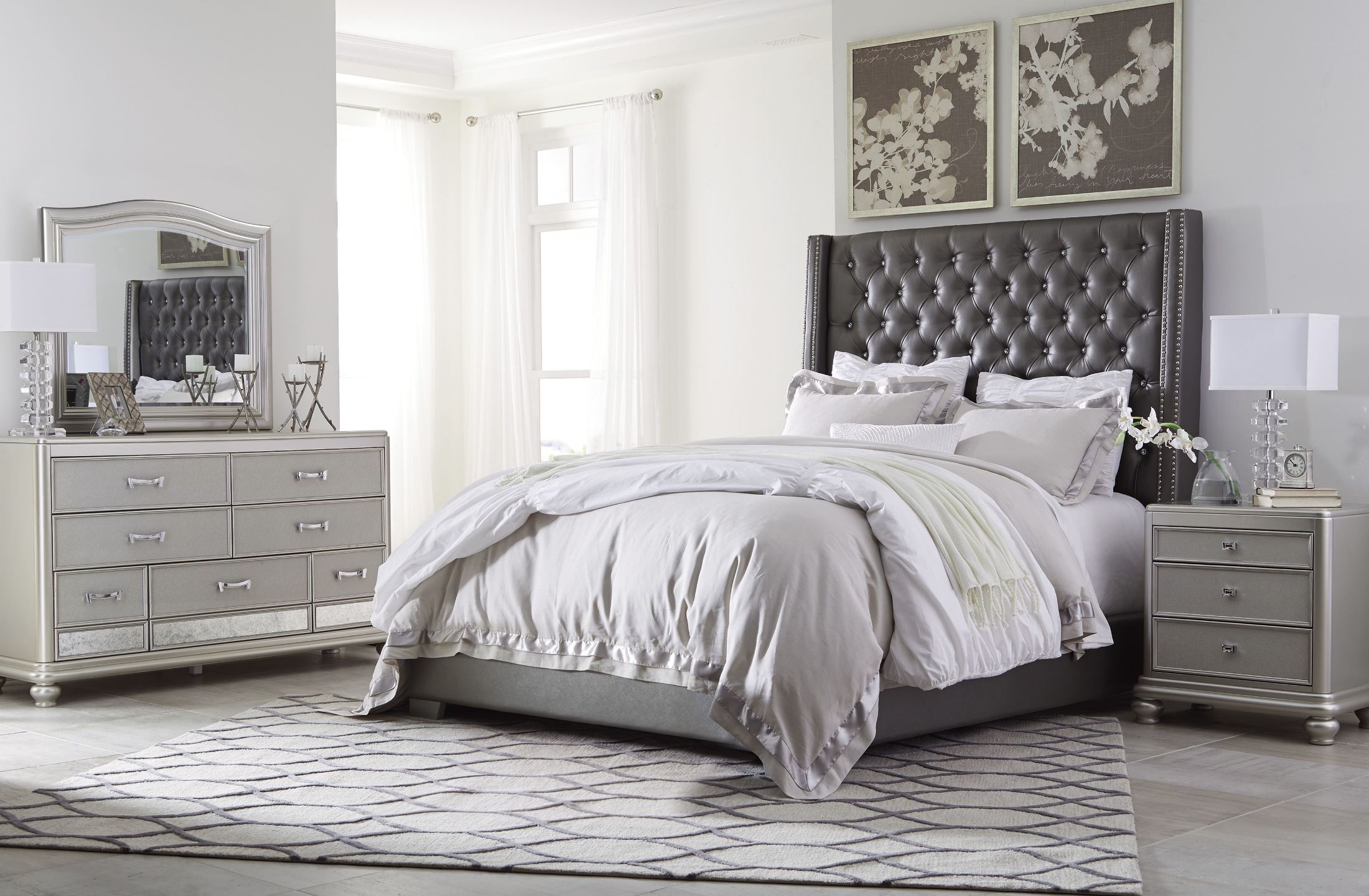 Coralayne Gray Textured Upholstered Panel Bedroom Set
