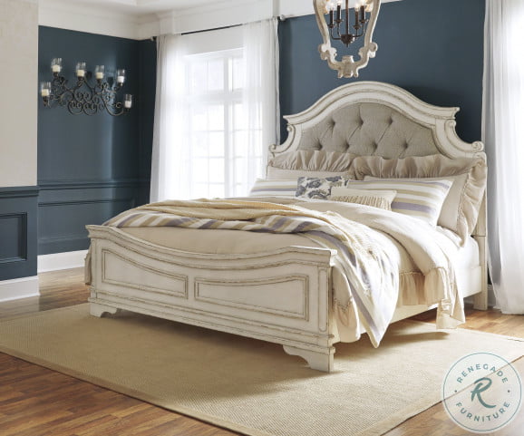 Realyn chipped two tone hot sale upholstered panel bedroom set