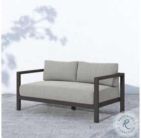 Sonoma Bronze And Faye Ash Ivory Strap Outdoor Loveseat