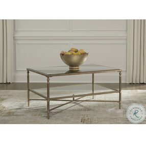 Cloverty Aged Gold Rectangular Cocktail Table